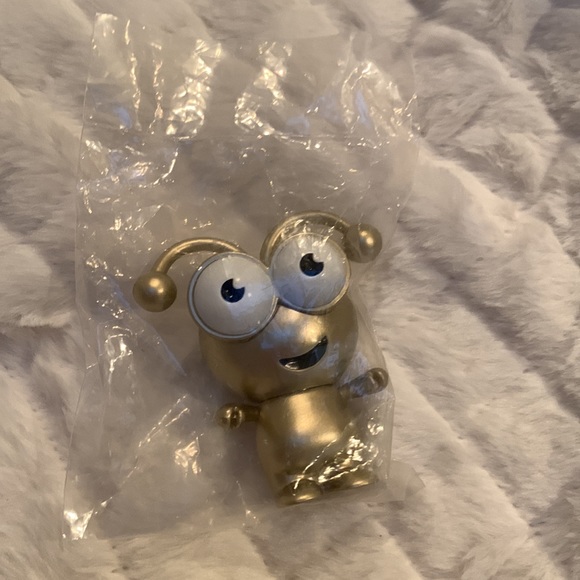 This is 1 of 2 Gold Cricut Cuties I have. It came in a Sealed Plastic Baggie bag - Picture 4 of 4
